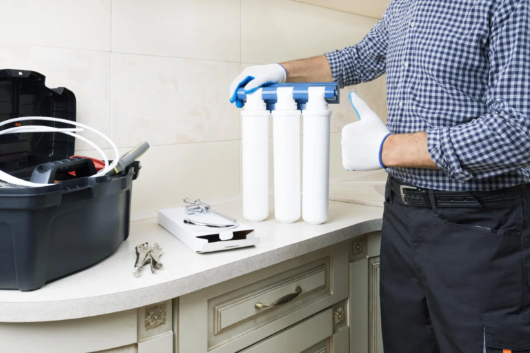 plumber-man-with-equipment-tools-gesturing-thumb-up-apartment